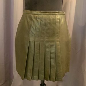 Highend designer Gianni Versace deep green leather kilt skirt. Never worn w/tags
